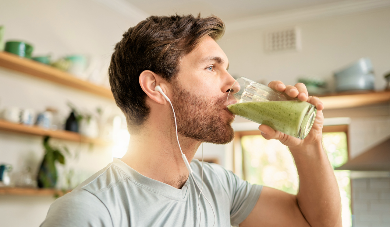 Man drinking smoothie