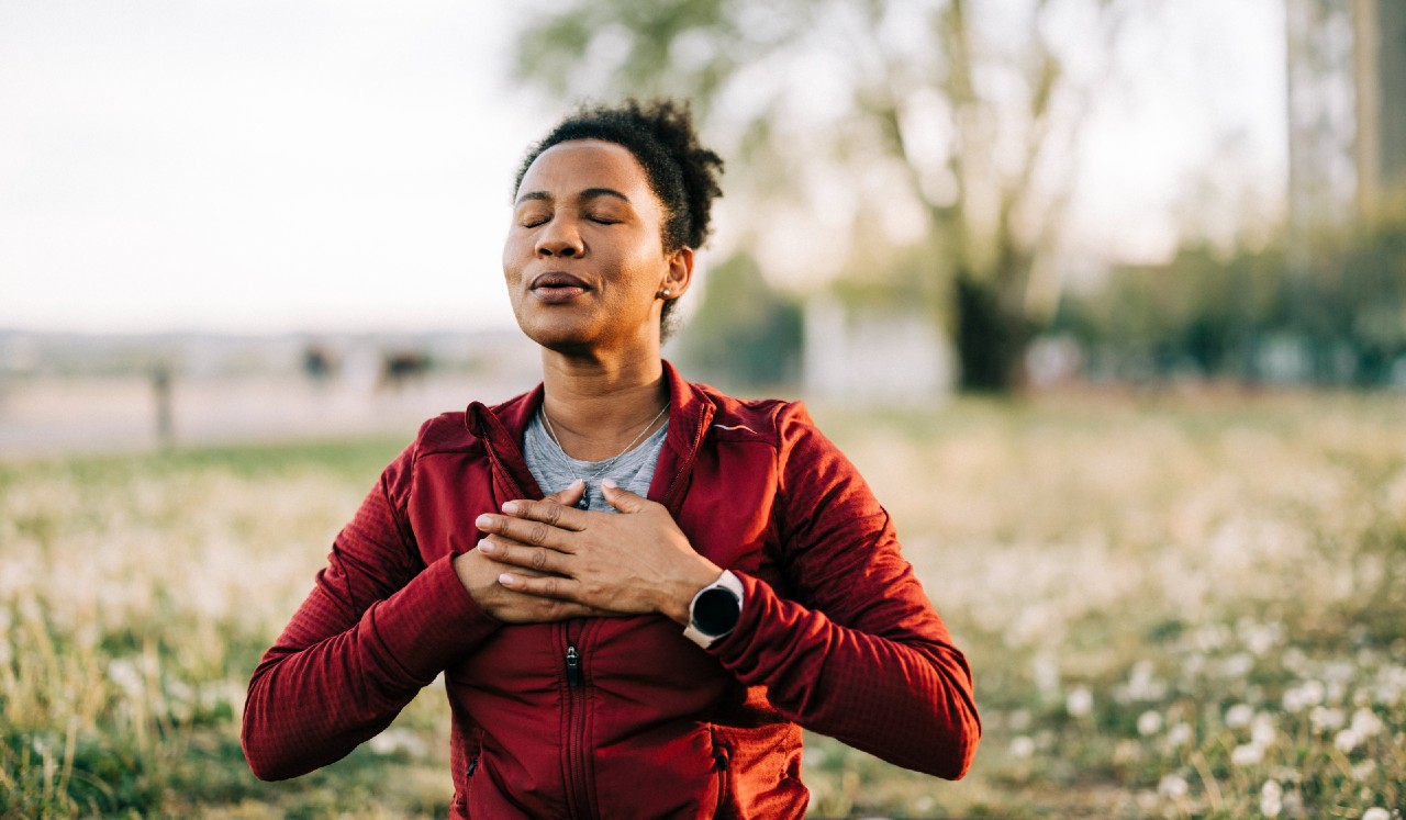 Woman practicing mindful breathing