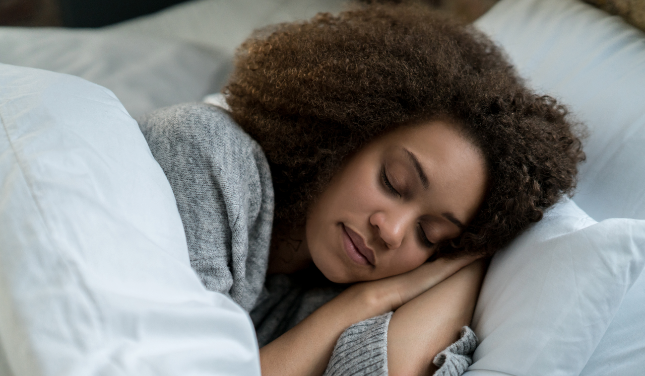 Woman sleeping in bed