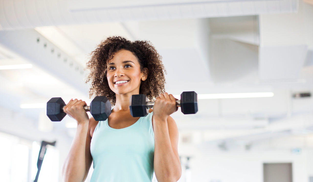 Woman using weights