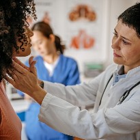 Doctor checking patient