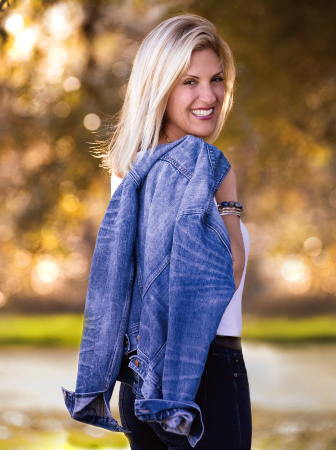 TIRR Memorial Hermann patient, Kristin Abello, looks back with a smile.