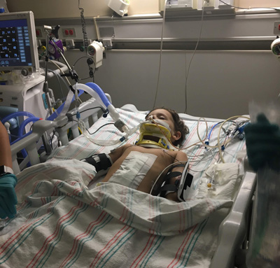 Grayson Guice in hospital bed