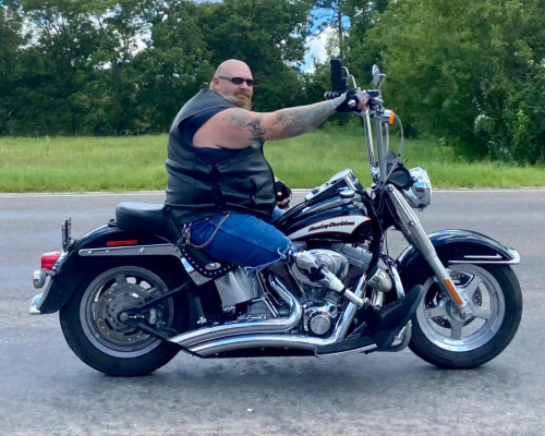 Red Duke Trauma Institute patient, Mathew Craft, rides his motorcycle after recovery.