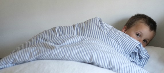 child sleep in bed