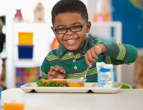 child eating lunch