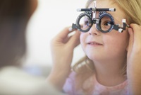 Girl Getting Fitted for Glasses