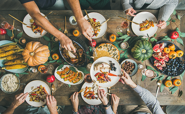 family having large dinner