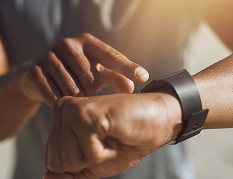Man checking fitness watch