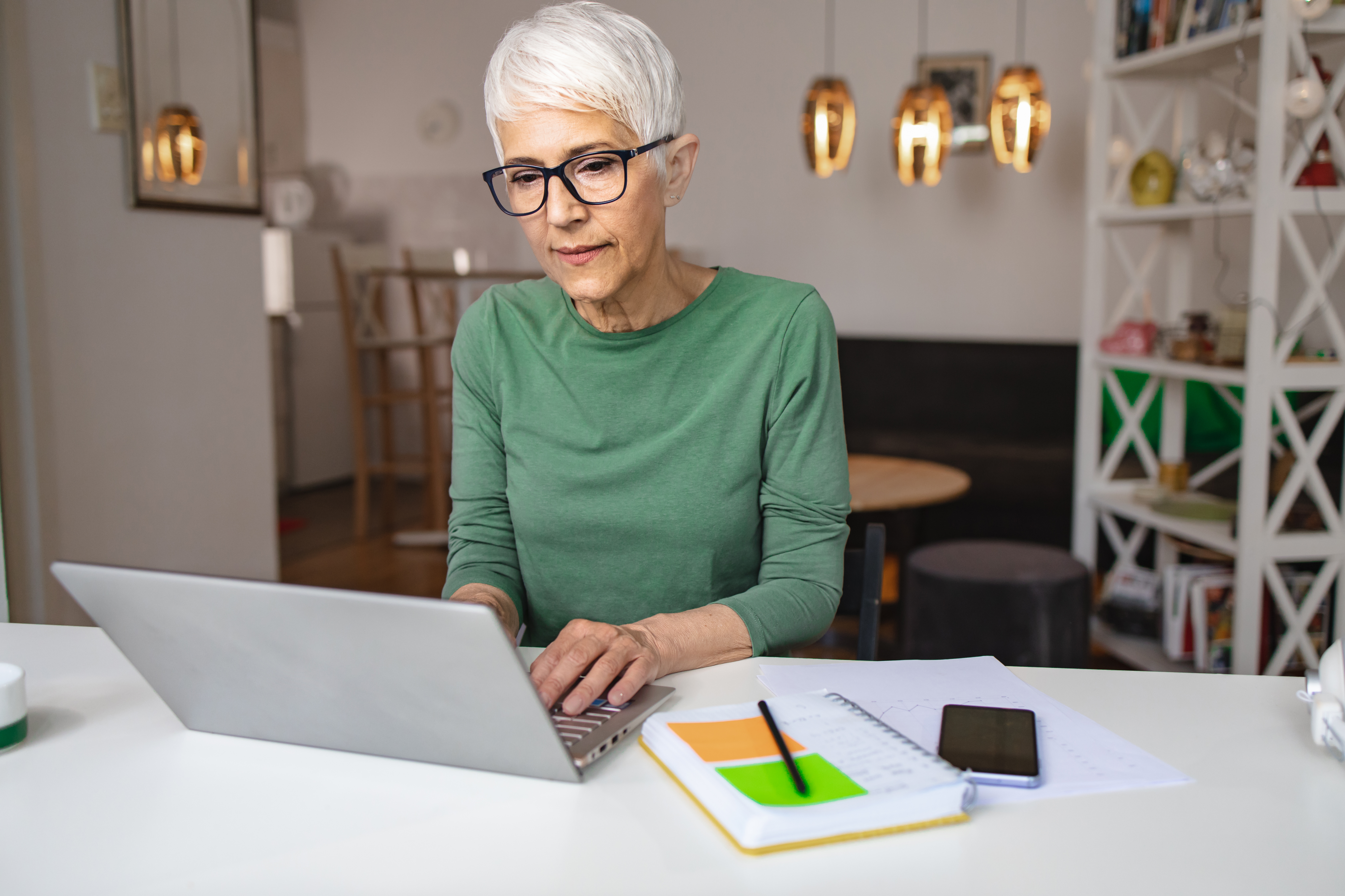 older woman responding to email