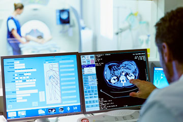 Doctor looking at scan results