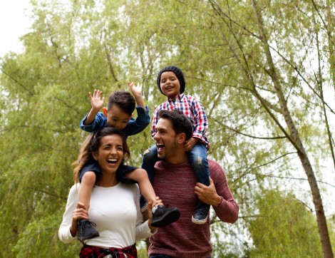 Family walking through the woods