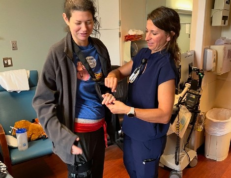 TIRR Memorial Hermann patient, April Favino, works with a physical therapist after accident.