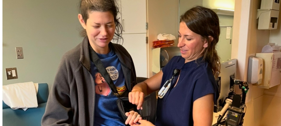 TIRR Memorial Hermann patient, April Favino, works with a physical therapist after accident.