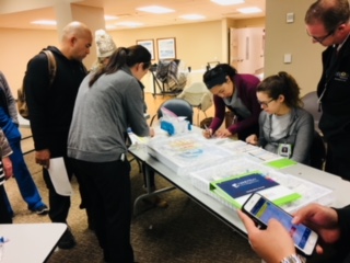 Volunteers help participants at event